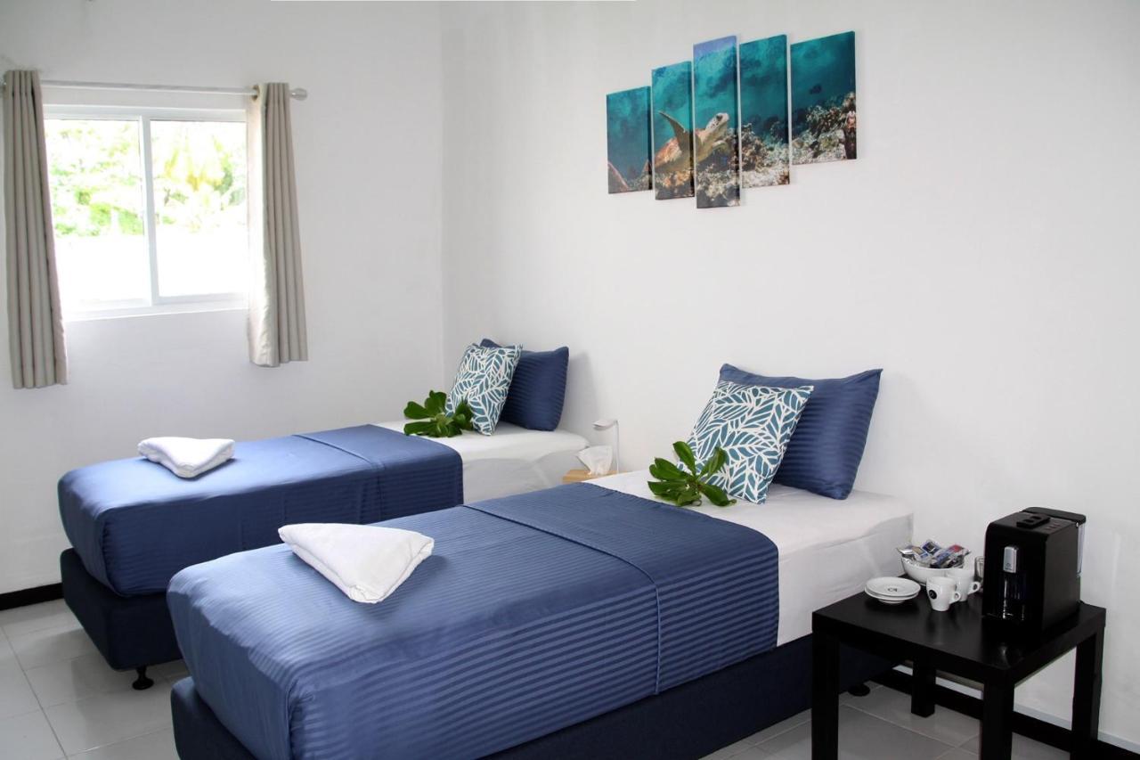 Varunula Surf Camp Thulusdhoo Bagian luar foto